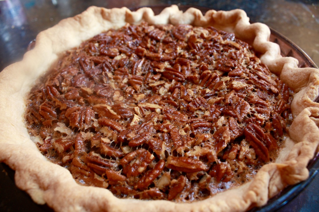 Classic Pecan Pie - A simple recipe for a classic, yet delicious pecan pie with a buttery, flaky crust. - Kate's Sweets