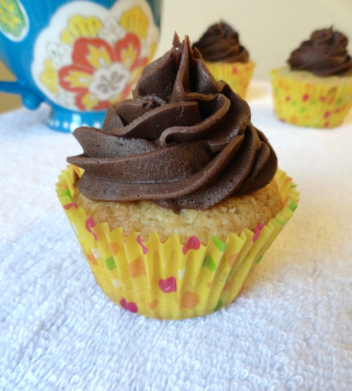 Classic Yellow Cupcakes with Chocolate Frosting - Moist yellow cupcakes with a classic chocolate buttercream frosted on top. - Kate's Sweets